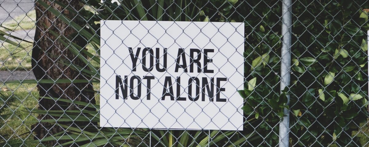 sign reminding readers "you are not alone"